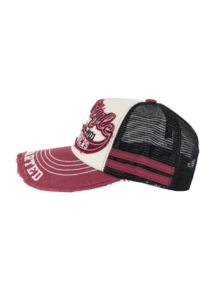 Vintage Graphic Cap IL506 Pink side product flat shot, dusty rose brim with distressed frayed edge, black mesh crown and pink stripe accent