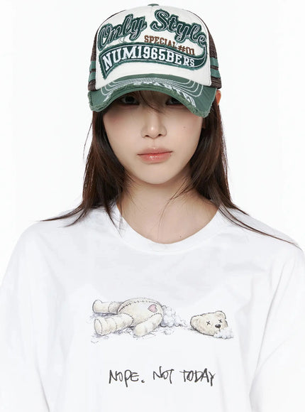 Vintage Graphic Cap IL506 Green front-facing close-up model shot, full embroidered Only Style SPECIAL #01 NUM1965BERS patch detail visible