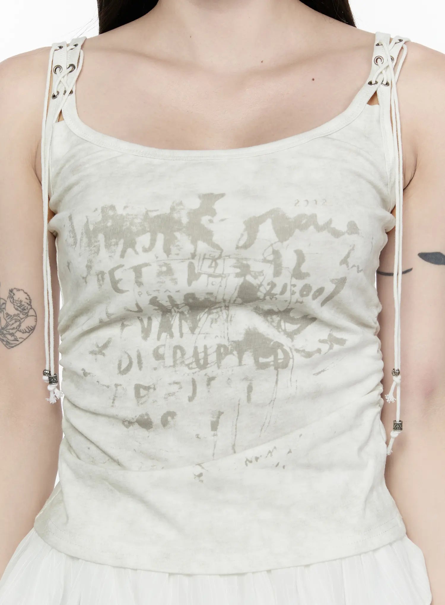Vintage Graphic Tank Top IL521 Light beige front shot model hand in hair graffiti print lace-up straps side ruching tiered pleated mini skirt half-body view