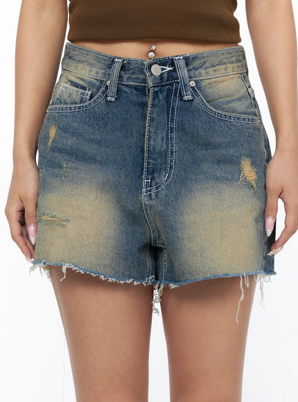 Vintage Wash Jorts CU523 Blue close-up front detail shot on model highlighting silver button fly white contrast stitching and distressed wash