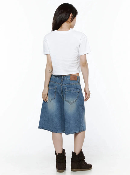 Vintage Wash Jorts IL502 Blue back view on model, full-length shot showing dual back pockets with stitched detail and brown leather logo patch