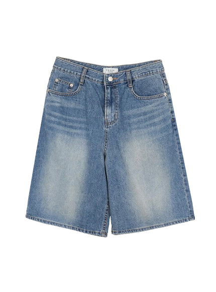 Vintage Wash Jorts IL502 Blue flat-lay front view, wide-leg denim shorts with THREE QUARTER label, silver button, washed blue denim texture