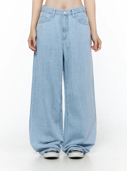 LEWKIN Viori Casual Wide-Leg Jeans IU525 Light blue front crop shot on model size S showing low-rise waistband, button closure, and ultra-wide denim leg hem pooling over sneakers