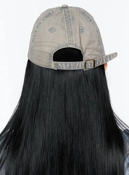 Washed Denim Cap IL509 Gray back detail on model showing adjustable strap buckle closure faded washed cotton texture label