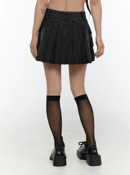 Washed Denim Mini Skirt CL508 Black back shot on model showing pleated skirt rear zipper side cargo pockets and raw hem fringe detail