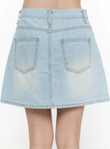 Washed Denim Skirt CL521 Light blue back close-up model shot showing two back patch pockets contrast gold stitching and center seam detail