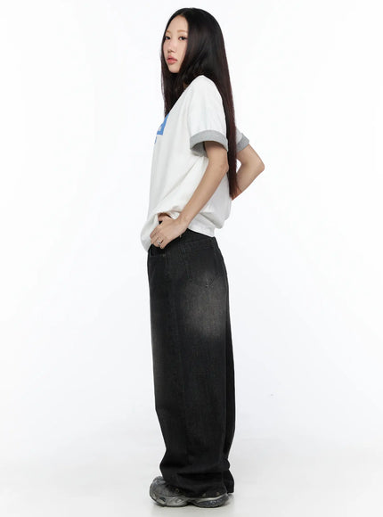 West Wide Leg Jeans CL527 Black full-body side shot on model showing ultra-wide leg profile, back pocket placement, and extra-long inseam with stacked hem