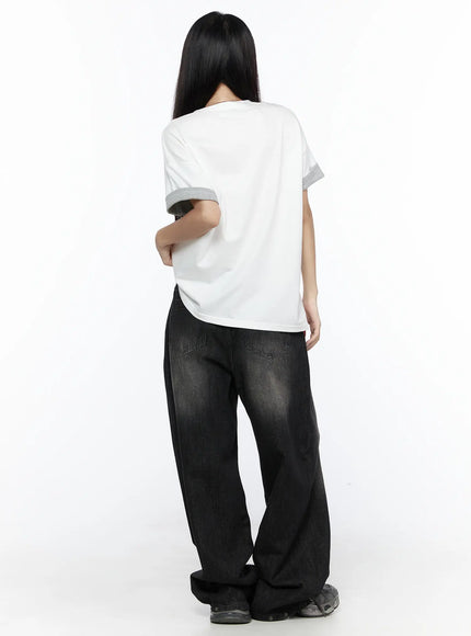 West Wide Leg Jeans CL527 Black full-body back shot on model showing plain white tee back, rear pocket V-stitch detail, and wide leg pooling at sneakers