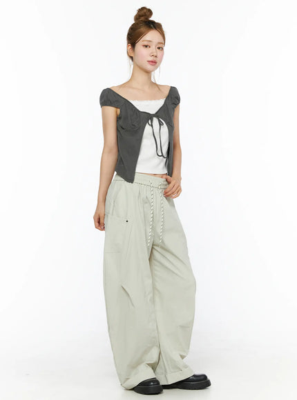 Wide Leg Cargo Pants CL501 Light beige full-length front shot on model with bun hairstyle styled with gray tie-front crop top and black loafers