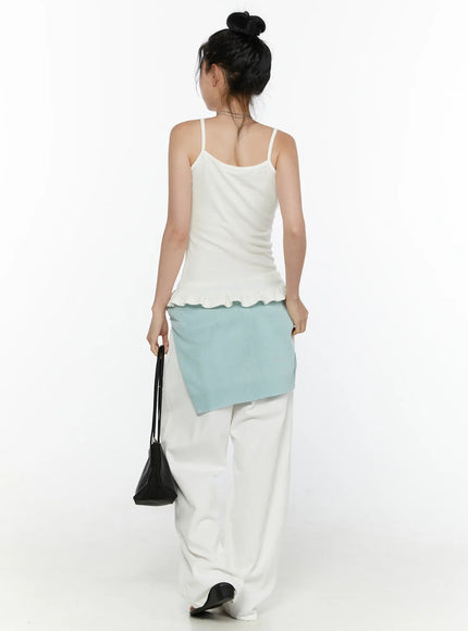 Wide Leg Cotton Pants CL521 White back view on model styled with white ruffle-hem cami top and light blue cardigan, holding black bag at side