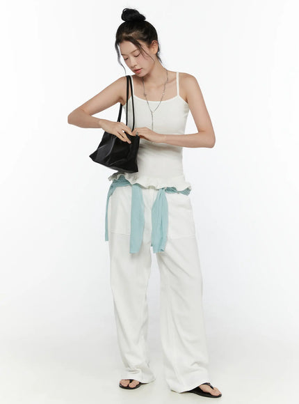 Wide Leg Cotton Pants CL521 White full outfit front view on model styled with white cami top, light blue cardigan tied at waist, and black tote bag