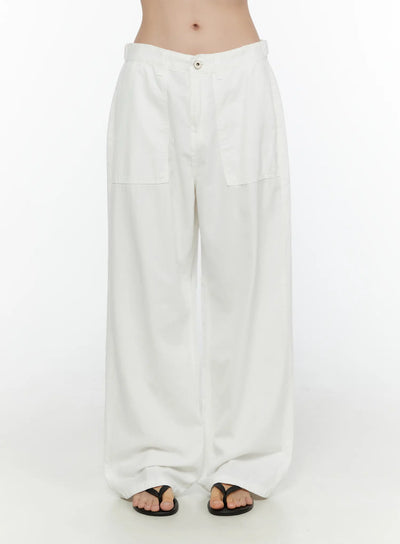 LEWKIN Wide Leg Cotton Pants CL521 White size S front view on model showing low-rise waistband, patch pockets, and relaxed wide leg silhouette with black thong sandals