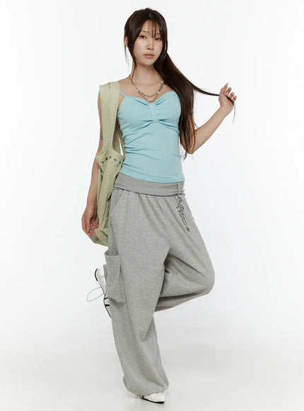 Wide Leg Sweatpants CL508 gray front full-body shot on model with long hair touching hair styled with blue tank and green shoulder bag