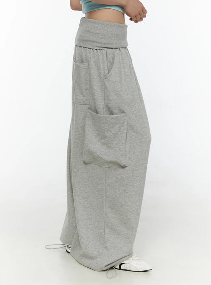 Wide Leg Sweatpants CL508 gray side shot on model showing fold-over waistband cargo pockets and wide-leg silhouette styled with blue cami
