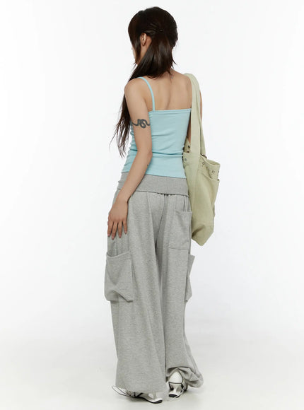 Wide Leg Sweatpants CL508 gray back full-body shot on model with ponytail carrying green tote bag showing back pockets and flowy hem