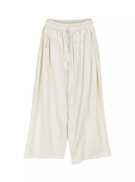 Wide Leg Sweatpants IU524 Light beige flat-lay front view showing full length wide-leg silhouette, smocked drawstring waistband and front pleats on white background