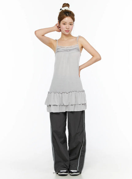 Wide Leg Track Pants CL501 Dark gray full-body front shot on model with scrunchie updo, styled with gray tiered ruffle cami dress, sneakers