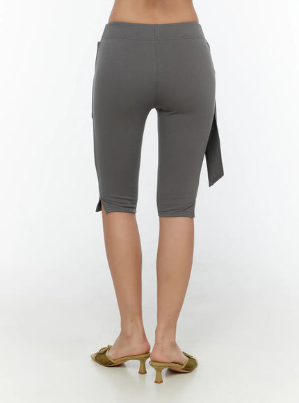 Wrap Capri Pants CU526 Dark gray back shot model showing smooth fitted capri leggings with tie sash extending from back waist