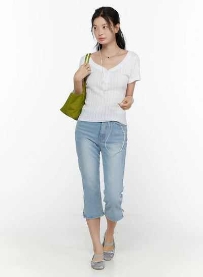 LEWKIN Zeli Capri Jeans CL521 light blue full-body front shot on model walking pose styled with white knit top and green tote bag