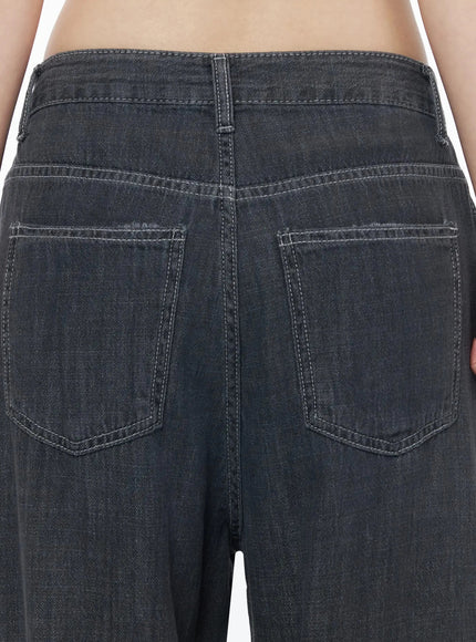 Zena Summer Baggy Jeans IU525 Black close-up detail of rear yoke, back patch pockets, and contrast white topstitching on denim fabric