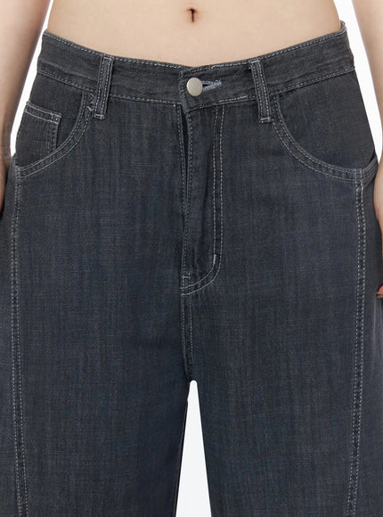Zena Summer Baggy Jeans IU525 Black close-up detail of waistband, front pockets, silver button, and contrast topstitching on model
