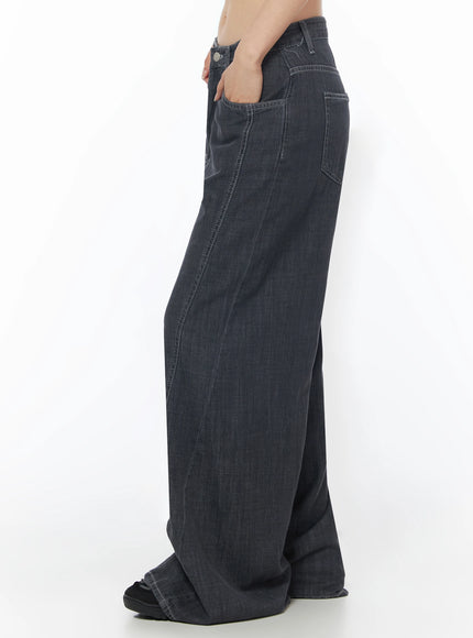 Zena Summer Baggy Jeans IU525 Black side waist-to-hem shot on model showing side pocket, seam line, and extreme wide-leg silhouette