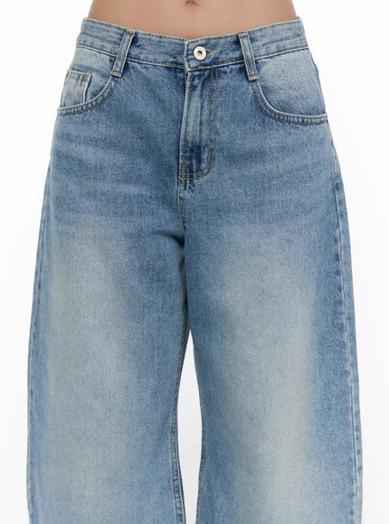Zivah Low-Rise Baggy Jorts CL513 light blue close-up detail shot on model showing waistband button fly front pockets and washed denim texture