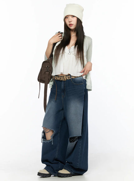 LEWKIN Zovie Distressed Washed Wide Leg Jeans CL514 Dark blue Size S full-length front shot on model styled with mint cardigan and beanie