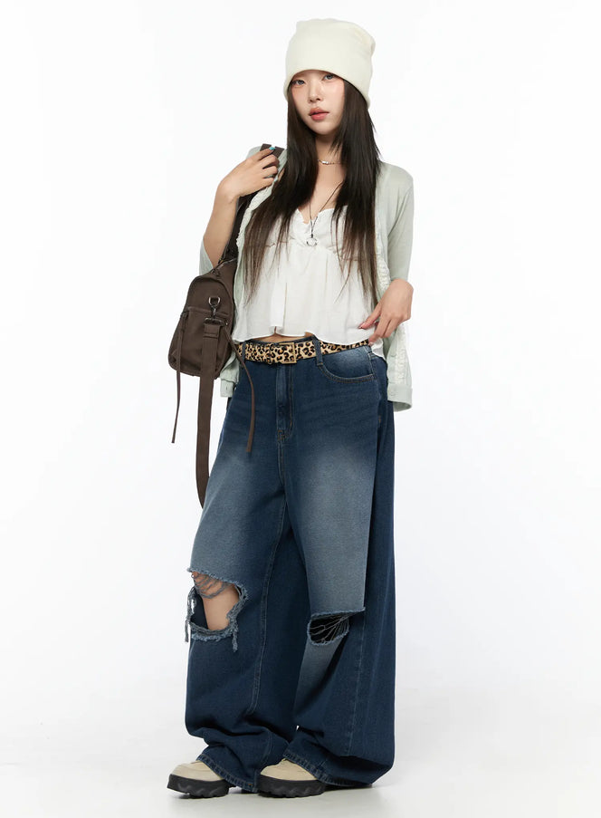 LEWKIN Zovie Distressed Washed Wide Leg Jeans CL514 Dark blue Size S full-length front shot on model styled with mint cardigan and beanie