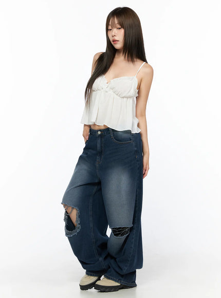 Zovie Distressed Washed Wide Leg Jeans CL514 Dark blue angled front shot on model with white crop cami showing wide-leg volume and knee rip details