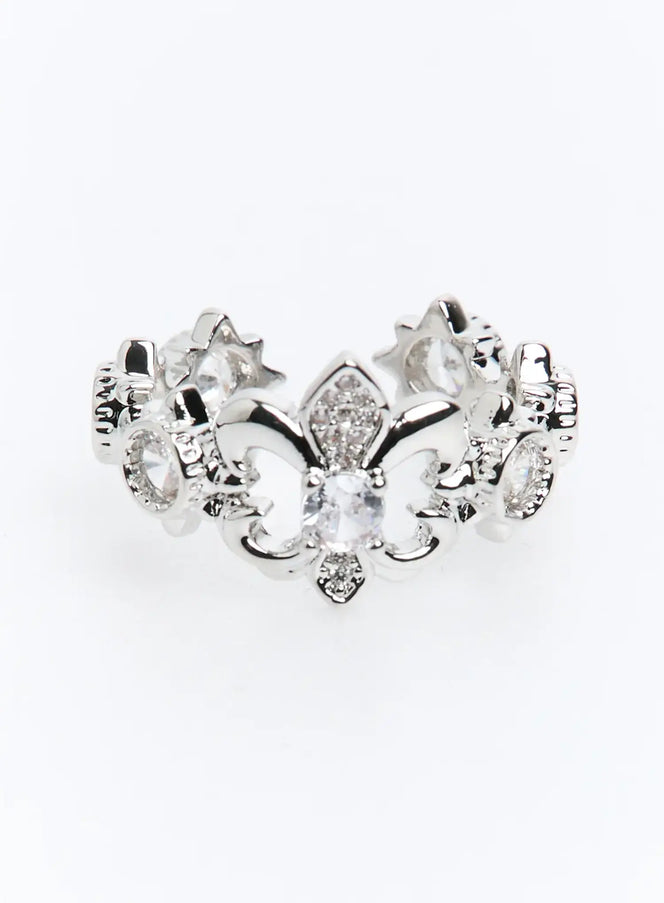 LEWKIN Bramante Ring IU503 in silver, top-down product shot, fleur-de-lis crown design with CZ crystal beads and pavé detailing, glamorous K-pop style.