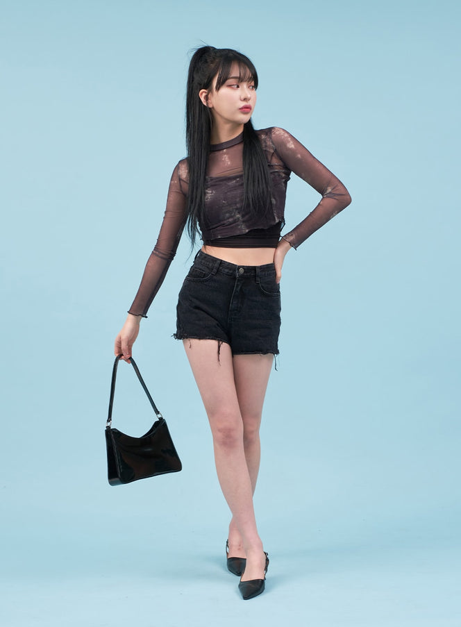 Basic Cropped Cami Top CA07 in black, full-body layering shot, worn under sheer tie-dye mesh long-sleeve top, styled with black denim shorts and black bag.