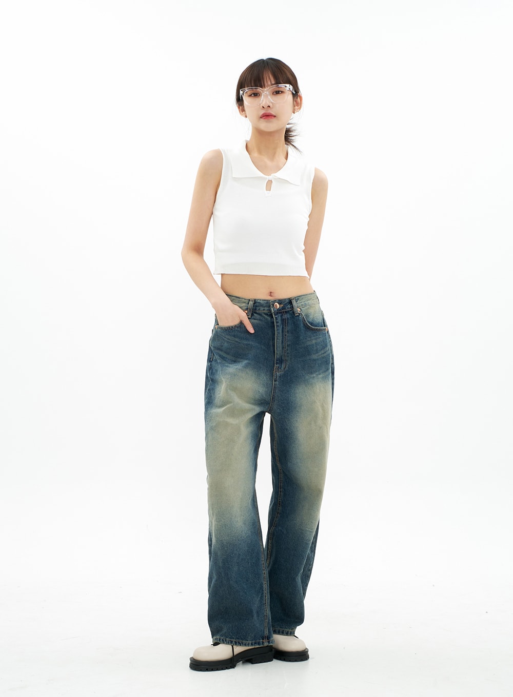 LEWKIN Bleached Wide Leg Denim Pants CA07 in vintage blue, full-body front view on model, wide-fit long cotton denim with bleached gradation wash, paired with white crop top.