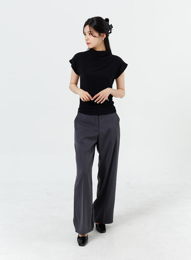LEWKIN Wide Leg Tailored Pants OM320 in charcoal gray, front full-length on model, wide-fit polyester-rayon blend with clean drape, paired with black mockneck top and patent flats.