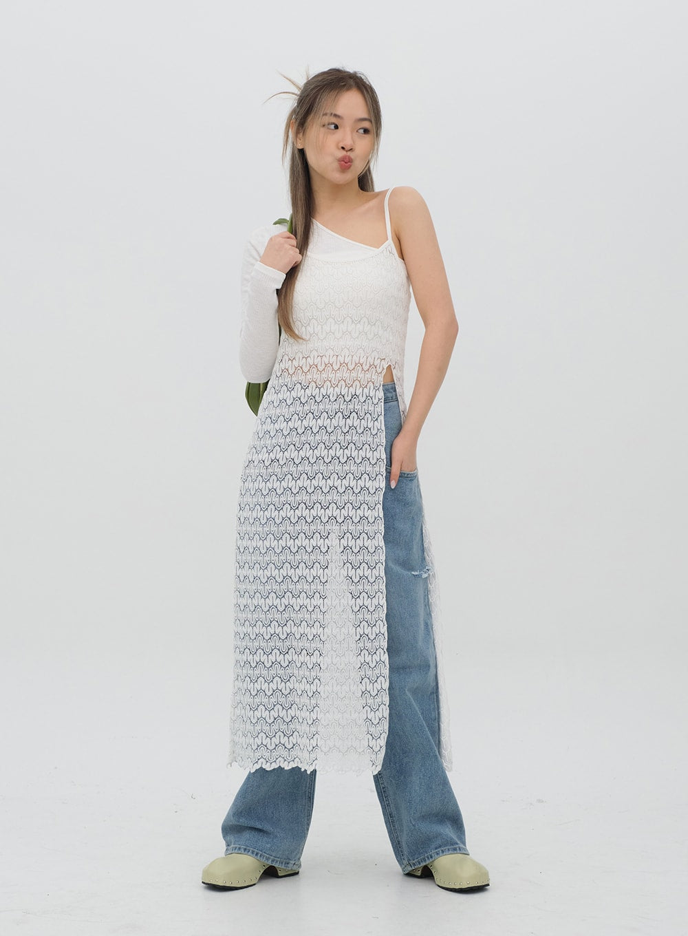 LEWKIN Torn Wide Leg Jeans C1002 in light blue, full-length front view on model layered under white lace midi dress, wide cotton fit with ripped knee detail, styled with green clogs.