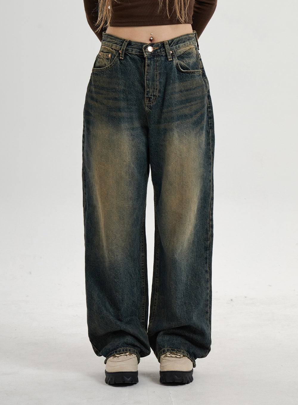 Vintage Washing Wide Leg Denim Pants CN14 in vintage washed indigo, front product-focus shot, wide leg silhouette with heavy yellow-brown wash fading and whisker details at thighs, button fly.