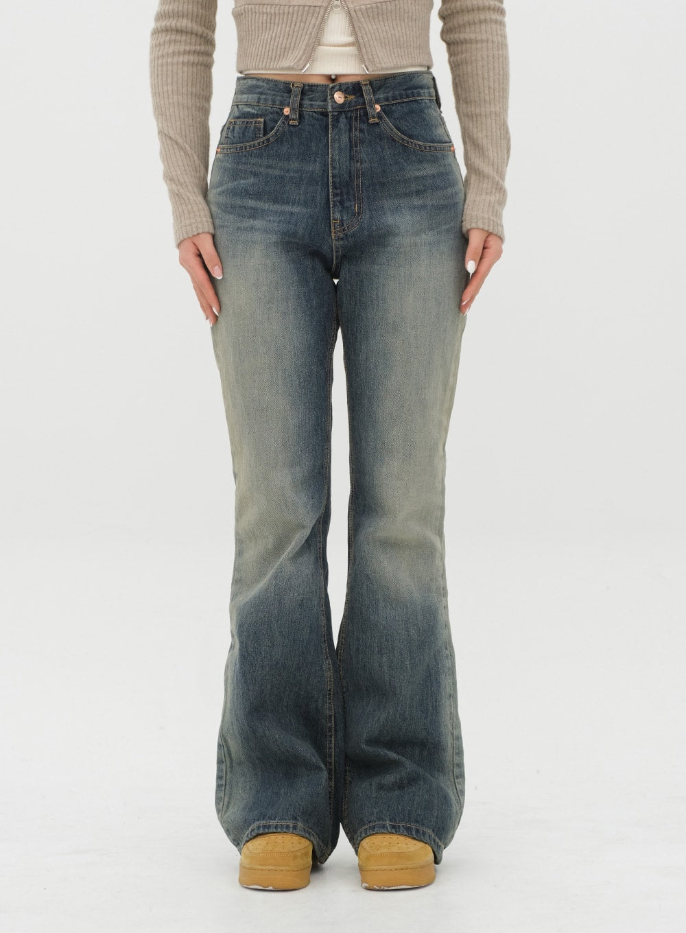 Boot Cut Jeans J20 in Dark Denim, front close-up waist-to-hem on model, gradation washed cotton denim, five-pocket detail and flared bootcut silhouette visible.