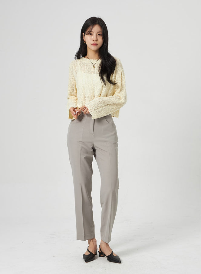 Ankle Tailored Pants OA314 in grey, full-length front shot on model, straight-fit high-waist tailored trousers, ankle length, paired with cream bouclé crop sweater and black mules.