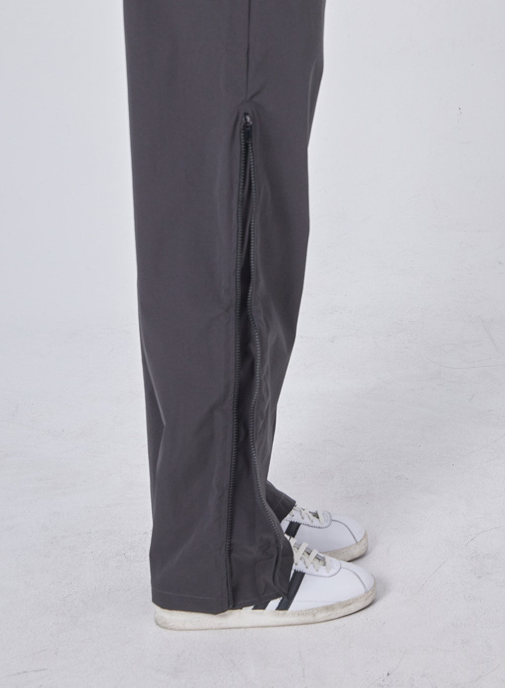 1017 ALYX 9SM Convertible zip-detailed shell track pants | THE OUTNET