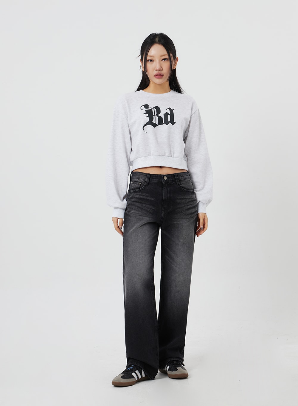 Mid-Rise Bootcut Jeans CF327 in black, full-body straight-on front on model, regular-fit washed denim with wide bootcut hem, paired with grey graphic crop sweatshirt.