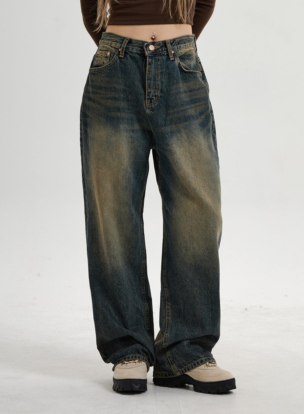 Vintage Washing Wide Leg Denim Pants CN14 in vintage washed indigo, front waist-to-hem close-up on model, showing five-pocket construction, button fly, and heavy tonal fading across wide leg.