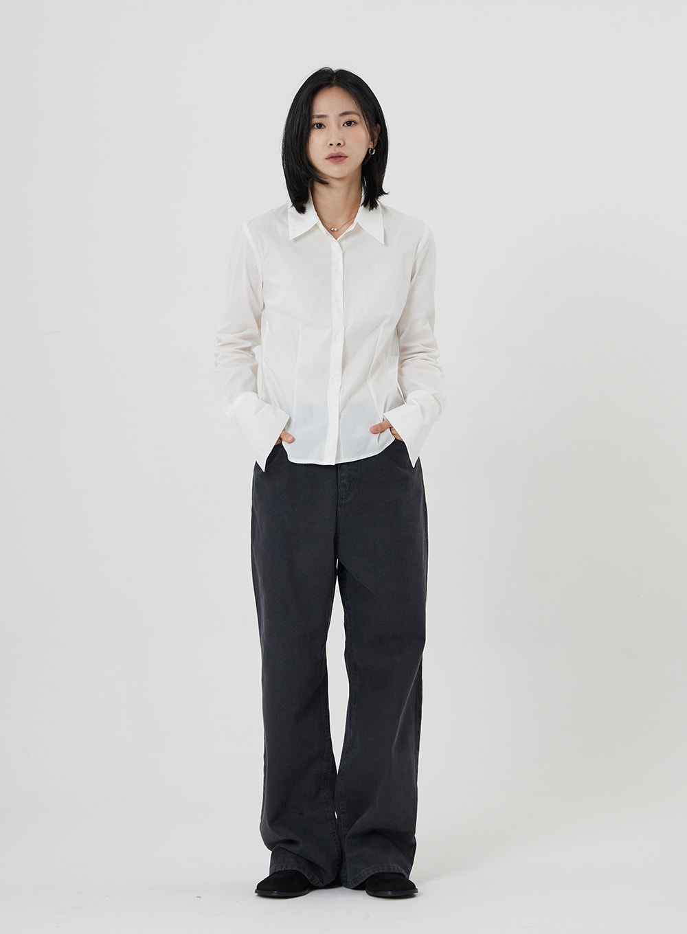 Maxi Denim Pants ON23 in charcoal grey, full-body front shot on model, wide-leg cotton denim without rolled cuffs showing full length, styled with white shirt only, relaxed casual fit.