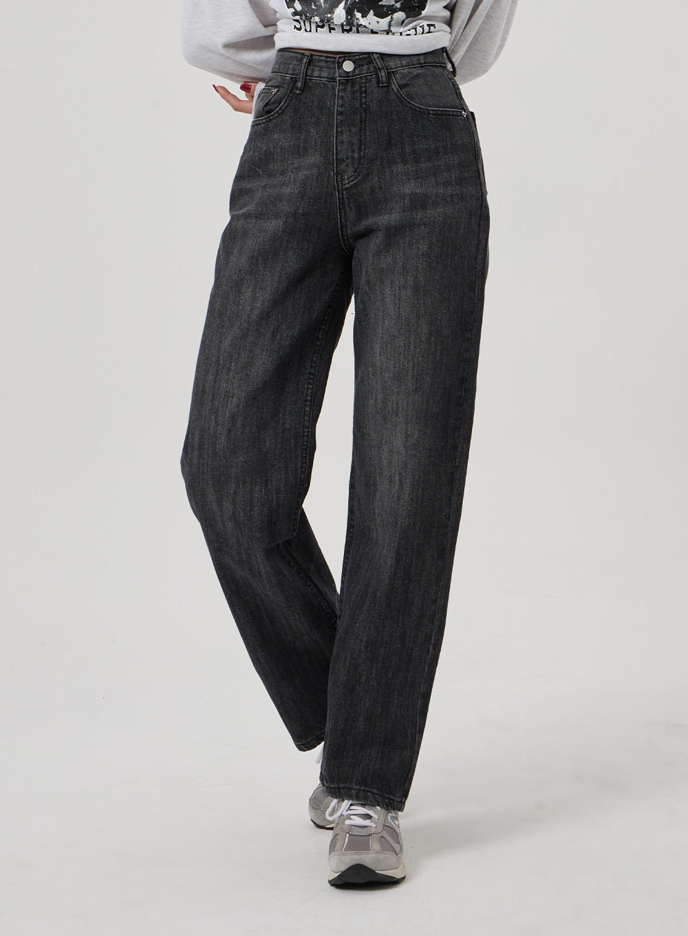 Wide Straight Leg Jeans BF310 in washed black, front waist-to-hem close-up on model, high-rise with five-pocket styling and straight wide leg, paired with grey sneakers.