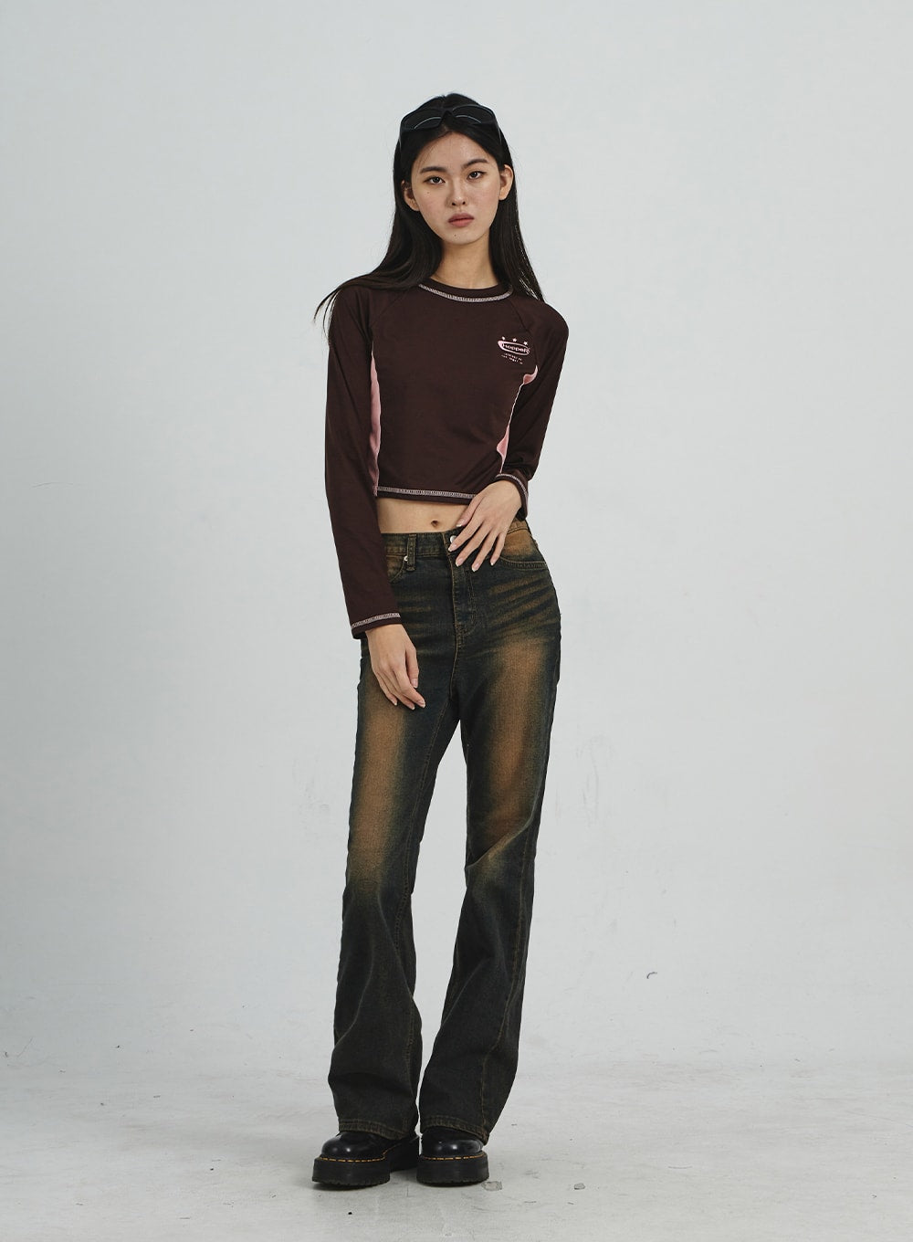 Vintage Washing Bootcut Jeans CD02 in dark washed denim, full-length front view on model, arms relaxed at sides, golden-amber wash contrast visible against dark denim, bootcut silhouette.