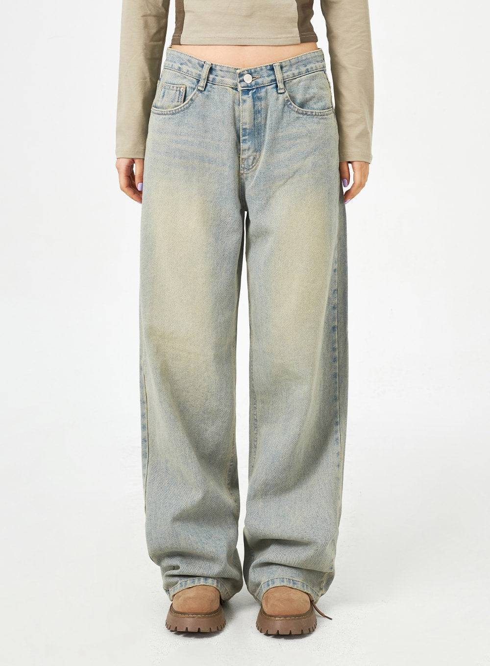Light Blue Baggy Jeans CM323 in light blue, front product-focused shot from waist to hem, no model face, wide-leg silhouette with yellow-blue washed denim and 5-pocket construction.