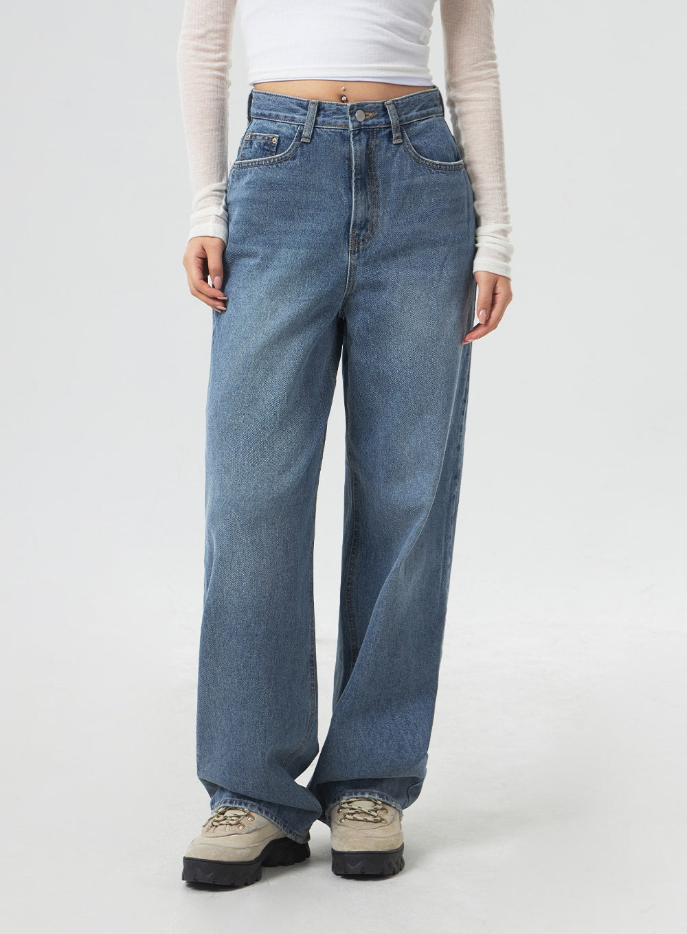 Wide Leg Mid-Wash Jeans CM331 in mid-wash blue, front waist-to-hem close-up on model, high-rise 5-pocket design with rivet details, wide-leg silhouette in washed cotton denim.
