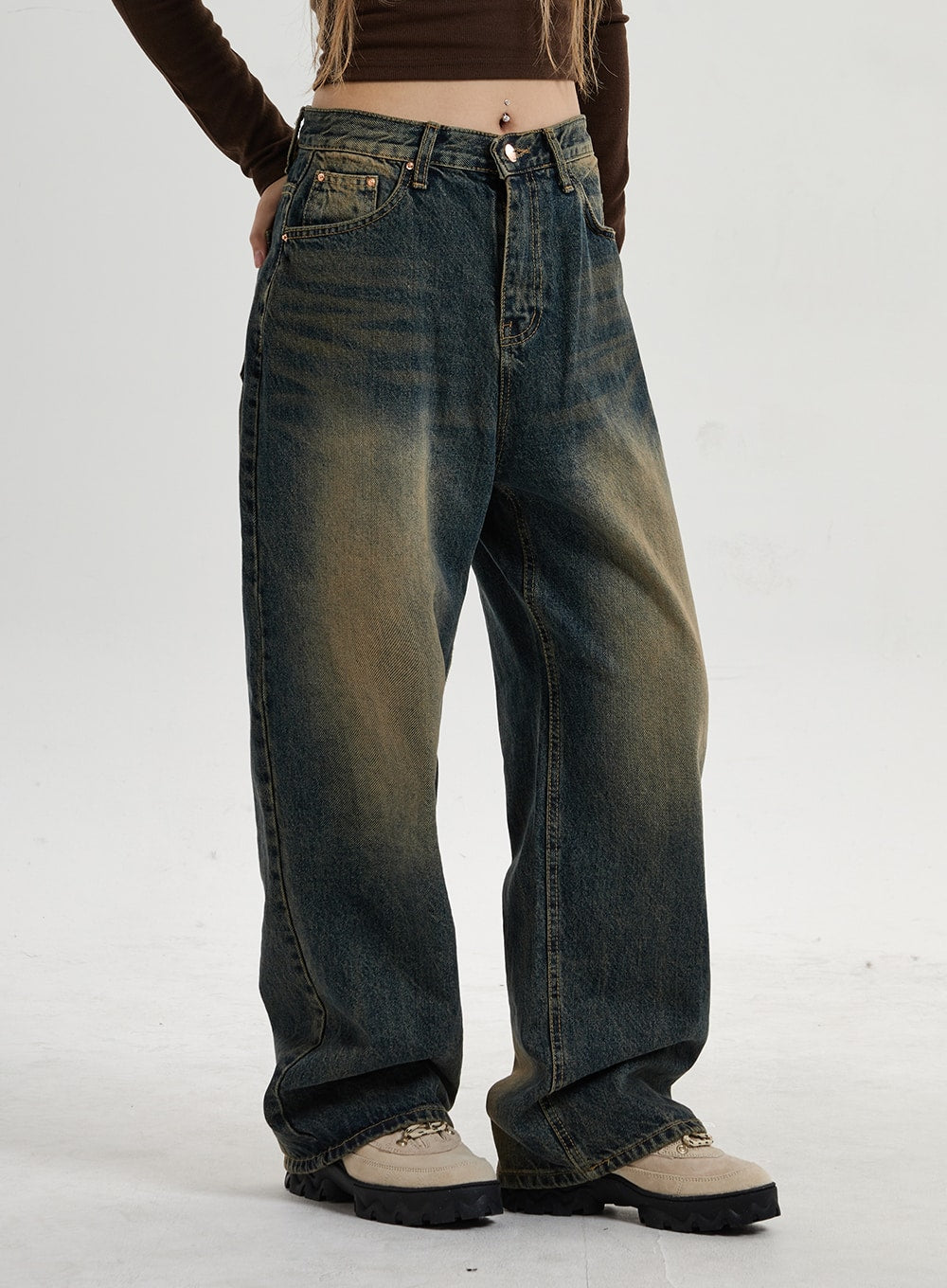 Vintage Washing Wide Leg Denim Pants CN14 in vintage washed indigo, side-angle waist-to-hem close-up on model, highlighting wide leg silhouette, yellow-brown fading, and side seam detail on cotton denim.