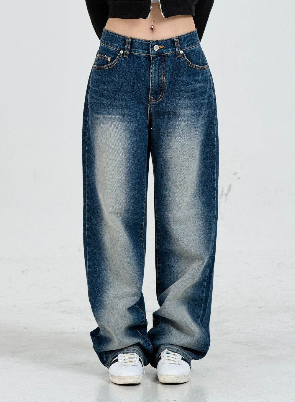 Wide Leg Faded Color Denim Pants CO11 in blue gradation, front waist-to-hem close-up on model, high-rise button fly, bold gradation from dark blue waist to light center, wide leg with stacked hem.
