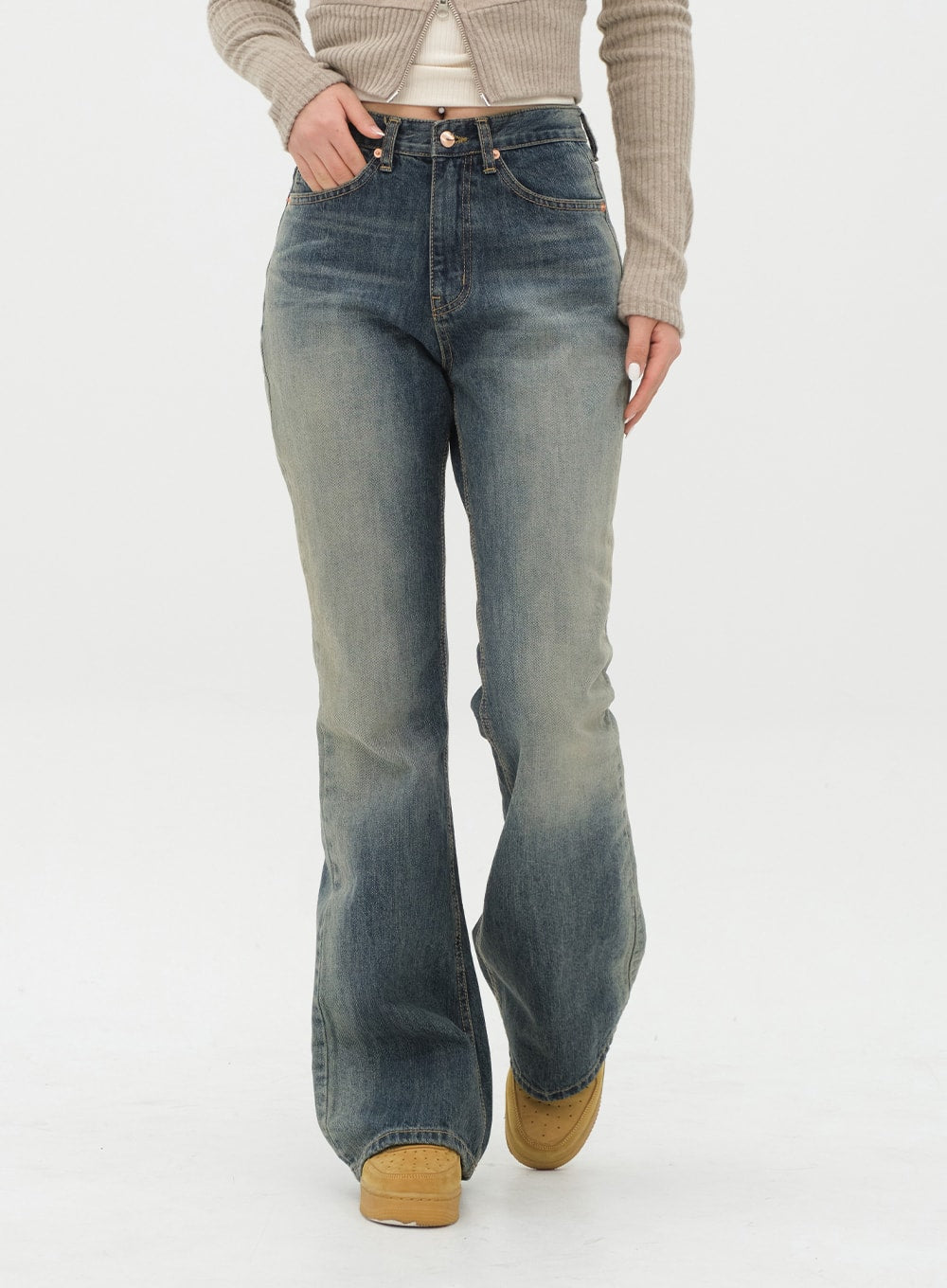 Boot Cut Jeans J20 in Dark Denim, front waist-to-hem close-up on model walking, gradation cotton denim with visible fading, bootcut flare and five-pocket detail.