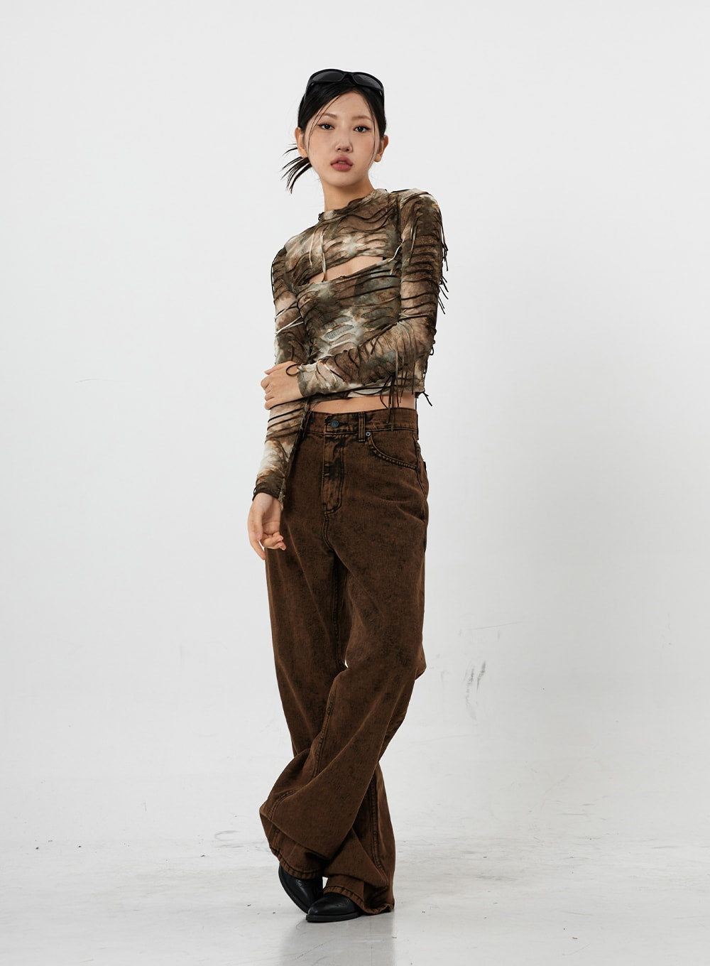 Washing Wide Jeans Unisex CS21 in brown, full-length angled front view on model, washed gradation cotton wide-leg jeans, relaxed street pose, hem pooling over black loafers.